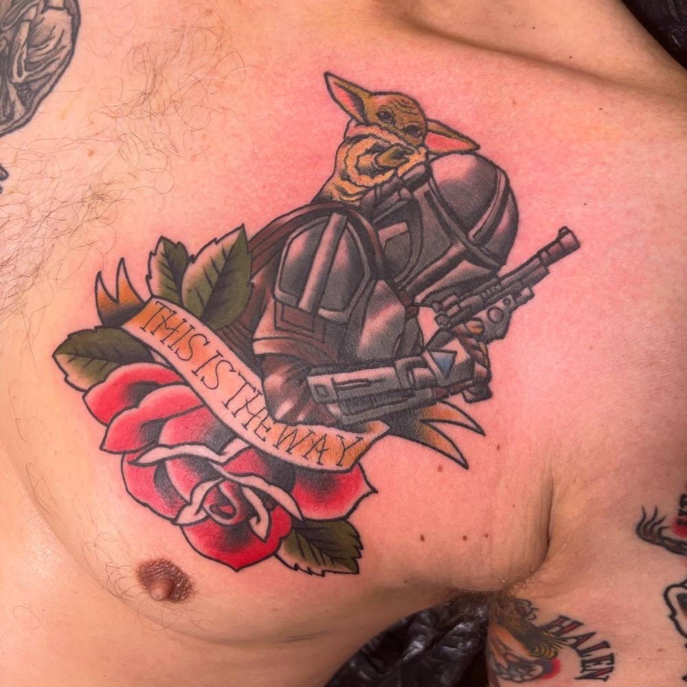Grogu and Mandalorian helmet with roses